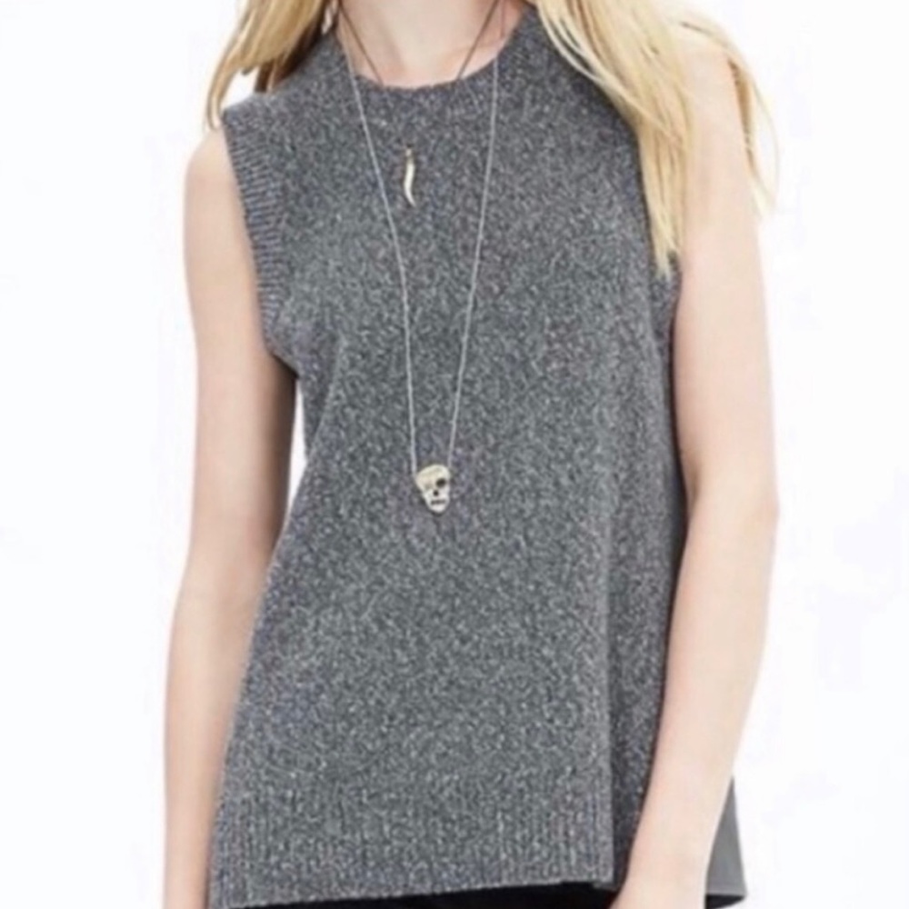 Banana Republic sleeveless sweater with faux leather side panels.